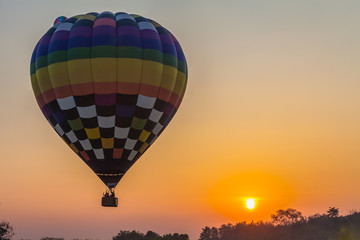 sweet sunrise on the back of hot air balloons festival at Shingha Park in Chiang Rai.