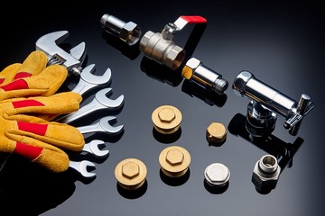 Set plumbing and tools on a green background.
