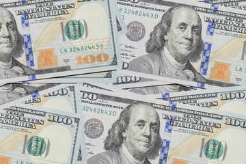 Obraz na płótnie Canvas Stack of one hundred dollar banknotes close up