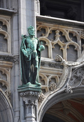 Statues on the walls of City Hall in Brussels, Belgium