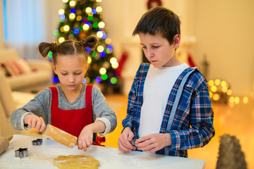 Kids baking Christmas cookies