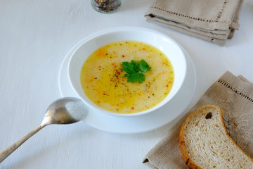 bowls of vegetable soup puree with cheese and seasonings, copy space