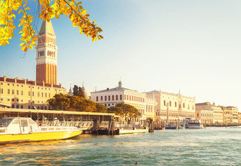 famous San Marco square embankment and lagoon waterfront at sunny day, Venice cityline, Italy at...