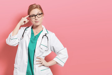 Young woman doctor solves a problem. Photo with copyspace for your text.