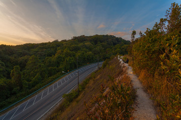 Fototapeta premium sunset between Noppamethanedol and Noppapol Phumsiri pagoda on Doi Inthanon national park..Doi Inthanon national park is the highest mountain of Thailand