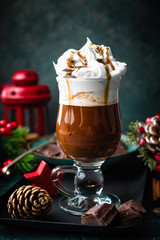 Hot chocolate with whipped cream with Christmas decorations