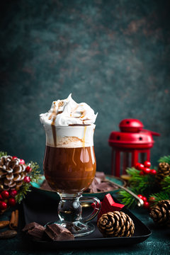 Hot chocolate with whipped cream with Christmas decorations