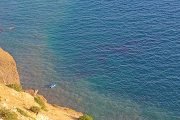 boat in the sea near the shore, top view