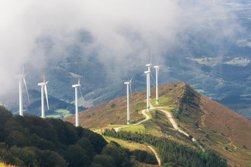 Renewable energy. Wind turbines, eolic park in scenic landscape of basque country, Spain.