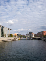Obraz premium Modern buildings on the River Spree in the government district of Berlin, near the Brandenburg Gate,