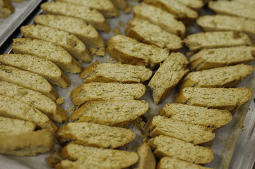 Crackers on a baking sheet. Production of tasty pastries