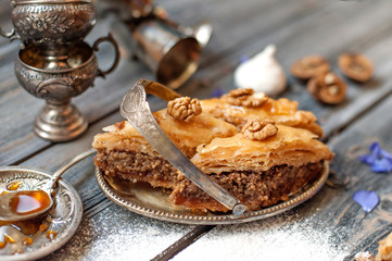 Pieces of tasty sweet pie on a metal dish