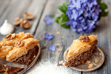 Pieces of tasty sweet pie on a metal dish