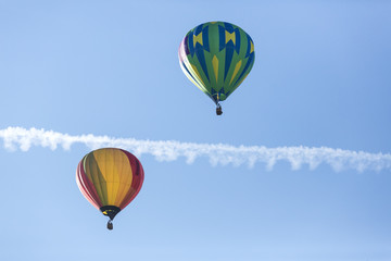 Hot air balloons flying in a beautiful blue clear sky