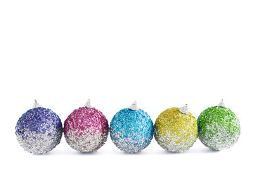 Christmas decor. Multicolored balls of sequins on white background.Isolated