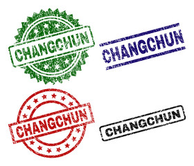 CHANGCHUN seal prints with corroded style. Black, green,red,blue vector rubber prints of CHANGCHUN caption with unclean style. Rubber seals with round, rectangle, rosette shapes.