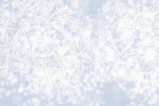 Frost and Snow border background of ice crystals and snowflakes on blue background