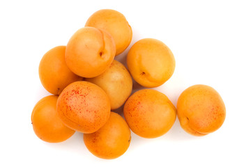 heap apricot fruits isolated on white background. Top view. Flat lay pattern