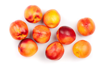 ripe nectarine with leaves isolated on white background. Top view. Flat lay pattern