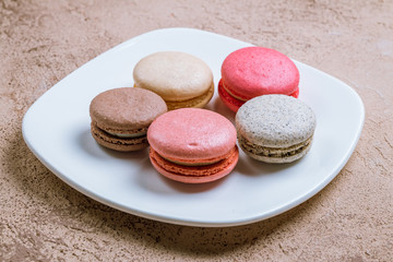 multicolored macaroons in plate