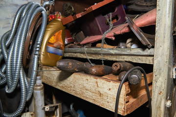 Old instruments on the rack in the old workshop