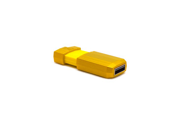 Yellow USB flash drive at an angle on a white isolated background