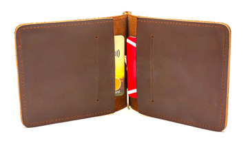 Brown leather clamp for money with cards on a white background