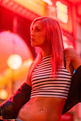 Cinematic portrait of girl with pink hair and neon lights