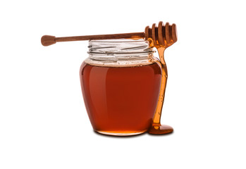 Honey in jar isolated on a white background