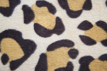 leopard patterned fabric close up background wallpaper