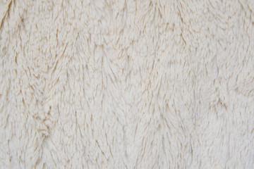 white artificial furry fabric close up detail
