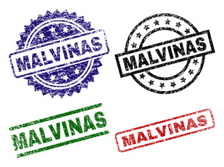 MALVINAS seal prints with corroded texture. Black, green,red,blue vector rubber prints of MALVINAS text with dirty texture. Rubber seals with circle, rectangle, medal shapes.