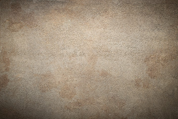 Dark brown stone or slate wall. Grunge background