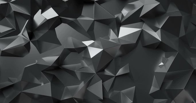 3d render black low poly graphite crystal abstract background. Seamlessly looping. Morphing 4k motion video
