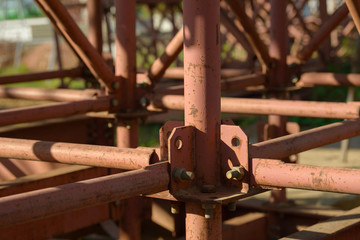 Scaffolding Elements Construction. Metal scaffolding tubes and bars. Construction site details. Bridge support.