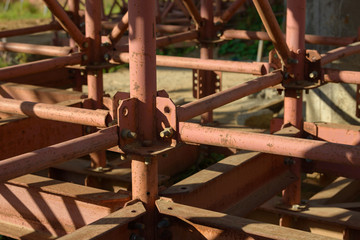 Scaffolding Elements Construction. Metal scaffolding tubes and bars. Construction site details. Bridge support.