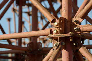 Scaffolding Elements Construction. Metal scaffolding tubes and bars. Construction site details. Bridge support.