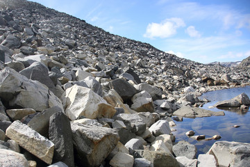 stone shore of a mountain lake