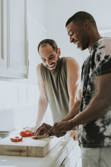 Gay couple cooking in the morning