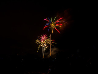 Beautiful vibrant and colorful red, blue, purple, pink, green, orange and yellow fourth of July...