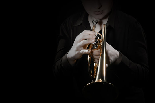 Trumpet player with brass instrument playing jazz music