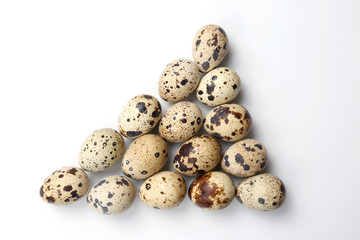 quail eggs on white background