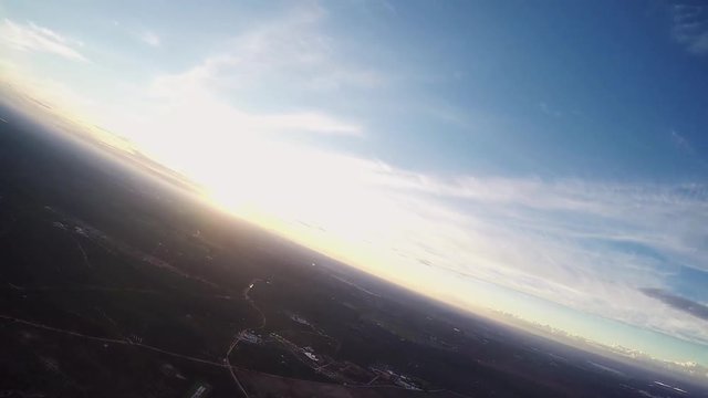 Professional skydiver fly on parachute in sky. Horizon. Adrenaline. Sunset. Evening