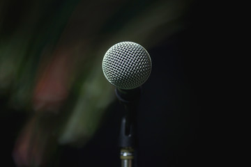 Analog microphone on stand.