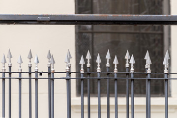 Forged iron fence with sharp arrows