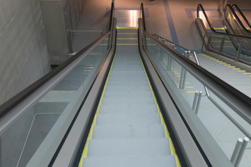 Detail of a big escalator on descend view