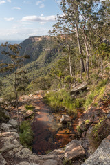 Fototapeta na wymiar The site of a waterfall (currently virtually dry) on the sandstone escarpment of Blackdown Tableland National Park, Queensland, Australia.