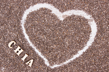 Heart shaped chia seeds, concept of food containing natural vitamins, fiber and minerals