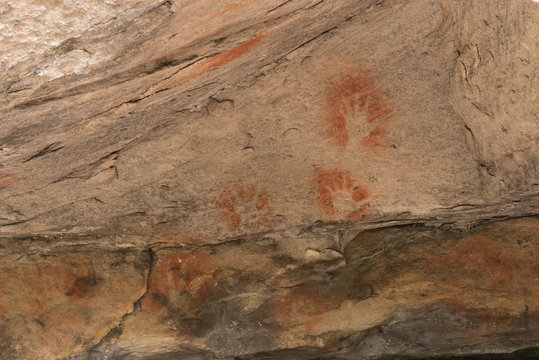 Ancient Aboriginal Stencil Art Of Hands On A Sandstone Rock Face In Blackdown Tableland National Park, Queensland, Australia.