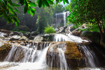 Beautiful waterfalls flow through the rocks in  forest at Soo Da Cave Roi et Thailand